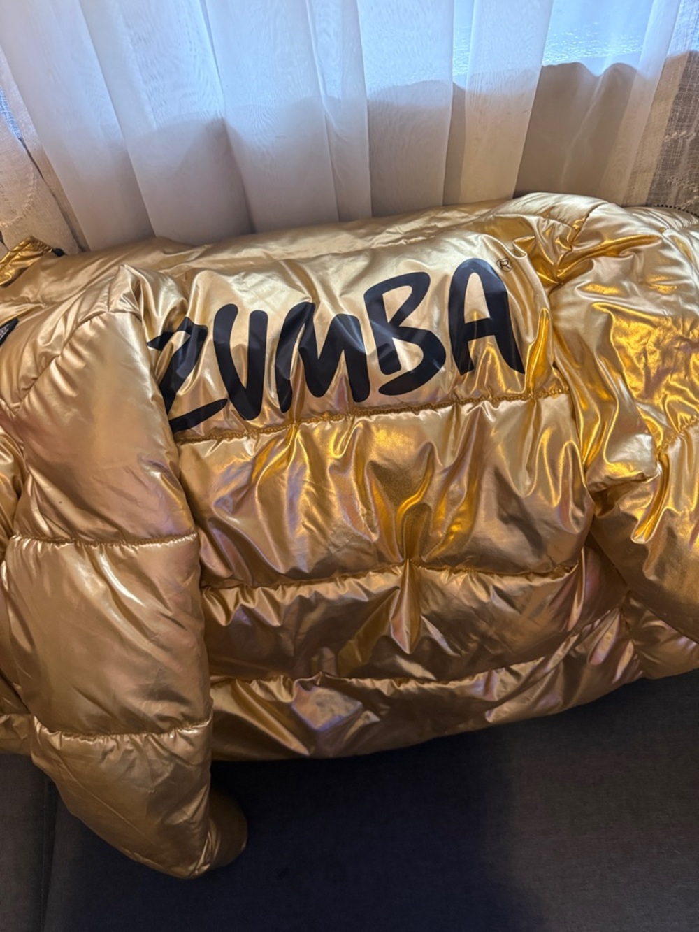Zumba Fitness Metallic Gold Puffer Jacket with Black Logo